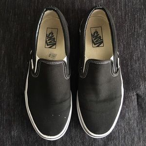 Vans classic black slip ons